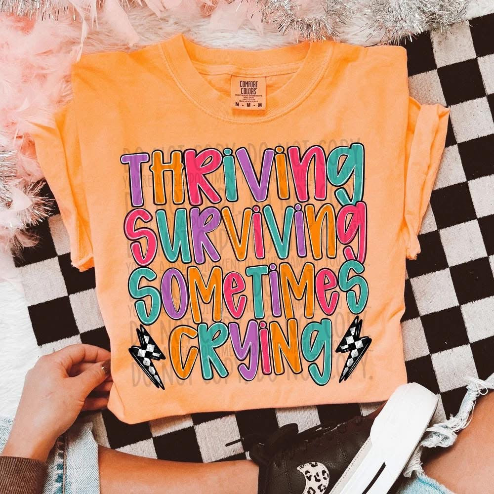 PRE-ORDER: Thriving Surviving Sometimes Crying Tee